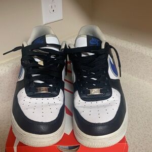 Nike Men's Black and White Sneakers with Blue Accents